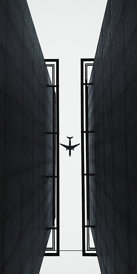 飞机低飞高空阴天风景壁纸